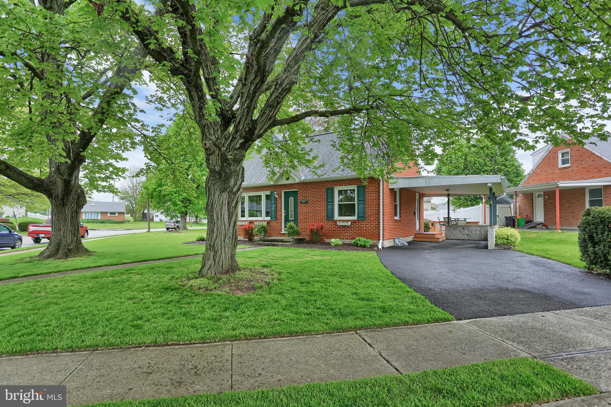 741 Gunnison Road York, PA 17404 - Photo 2 of 35 a front view of a house with garden