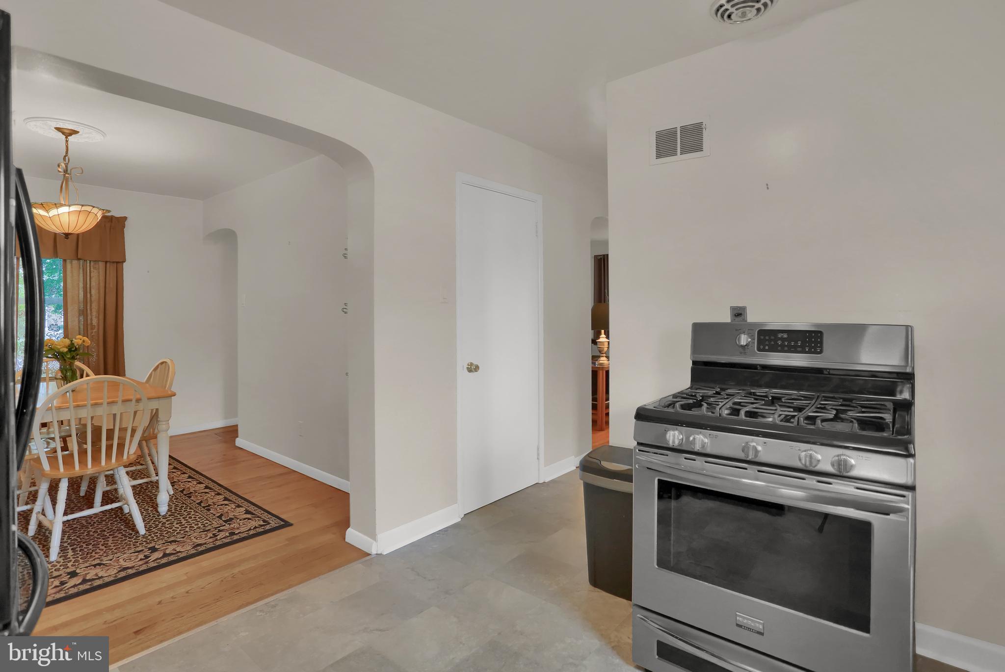 741 Gunnison Road York, PA 17404 - Photo 14 of 35 a kitchen with a stove and a table
