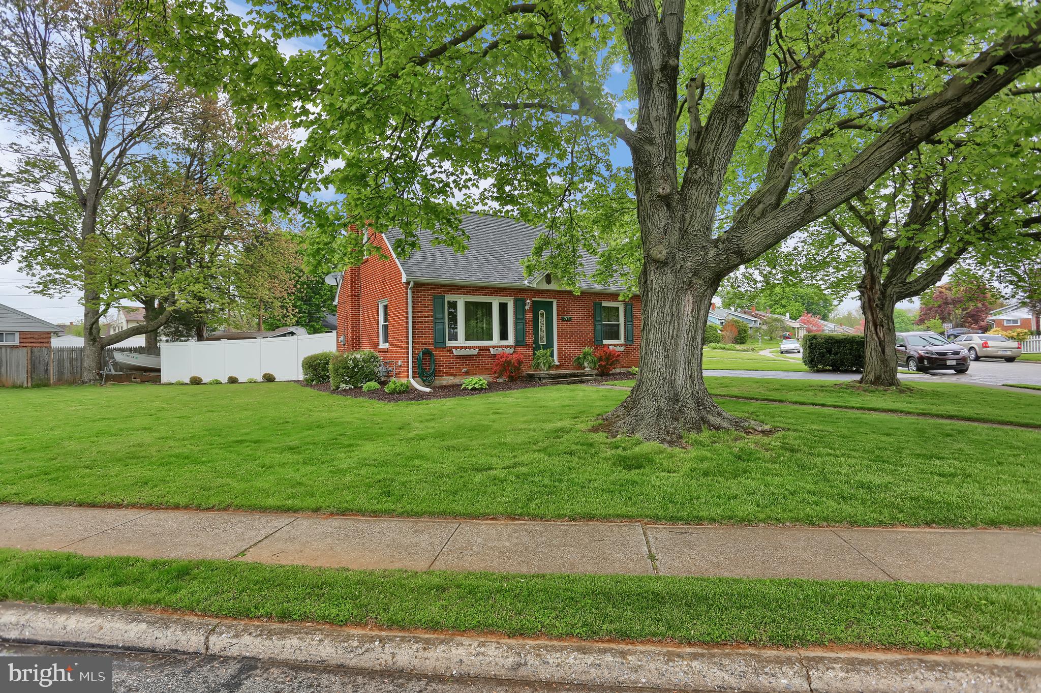 741 Gunnison Road York, PA 17404 - Photo 3 of 35 a front view of a house with a yard