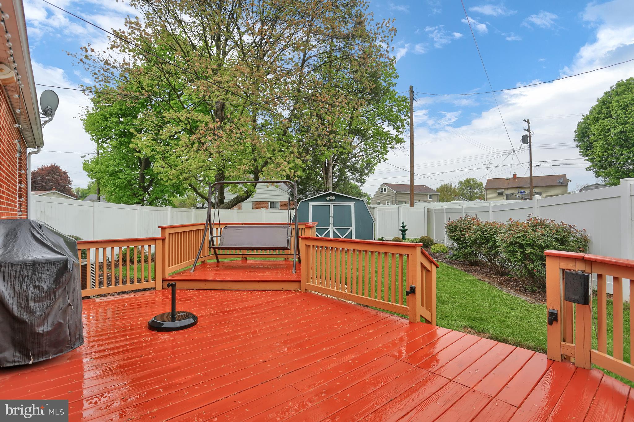 741 Gunnison Road York, PA 17404 - Photo 29 of 35 a view of a chairs and deck with wooden floor and fence