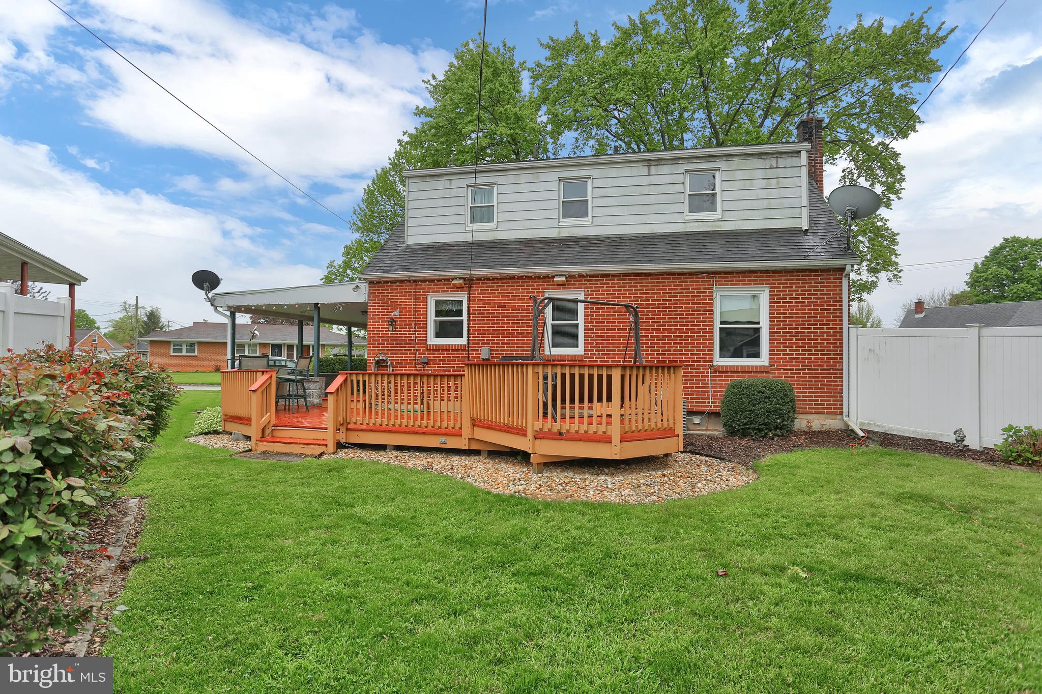741 Gunnison Road York, PA 17404 - Photo 32 of 35 a view of a house with a yard and sitting area