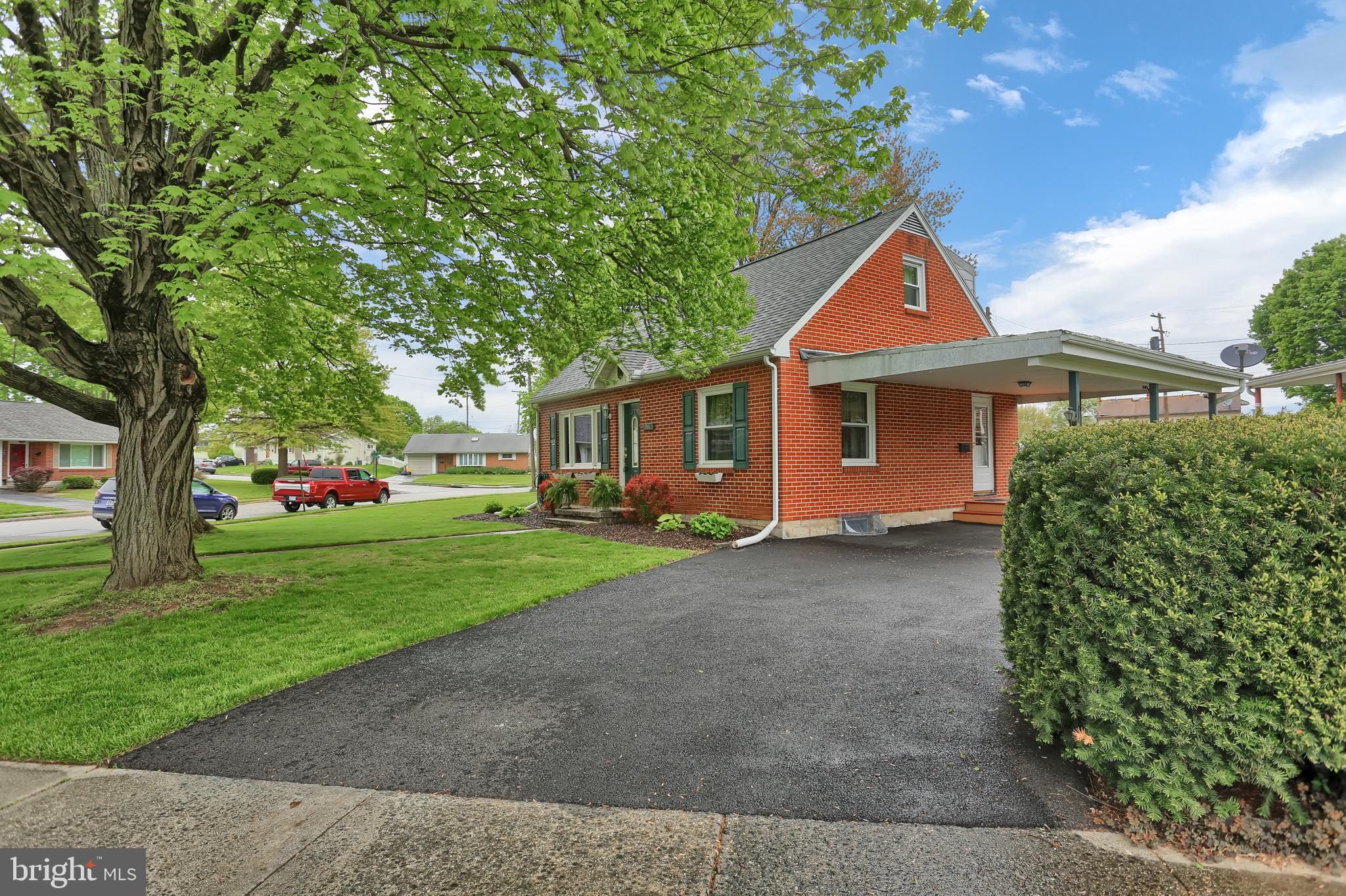 741 Gunnison Road York, PA 17404 - Photo 35 of 35 a front view of a house with a garden