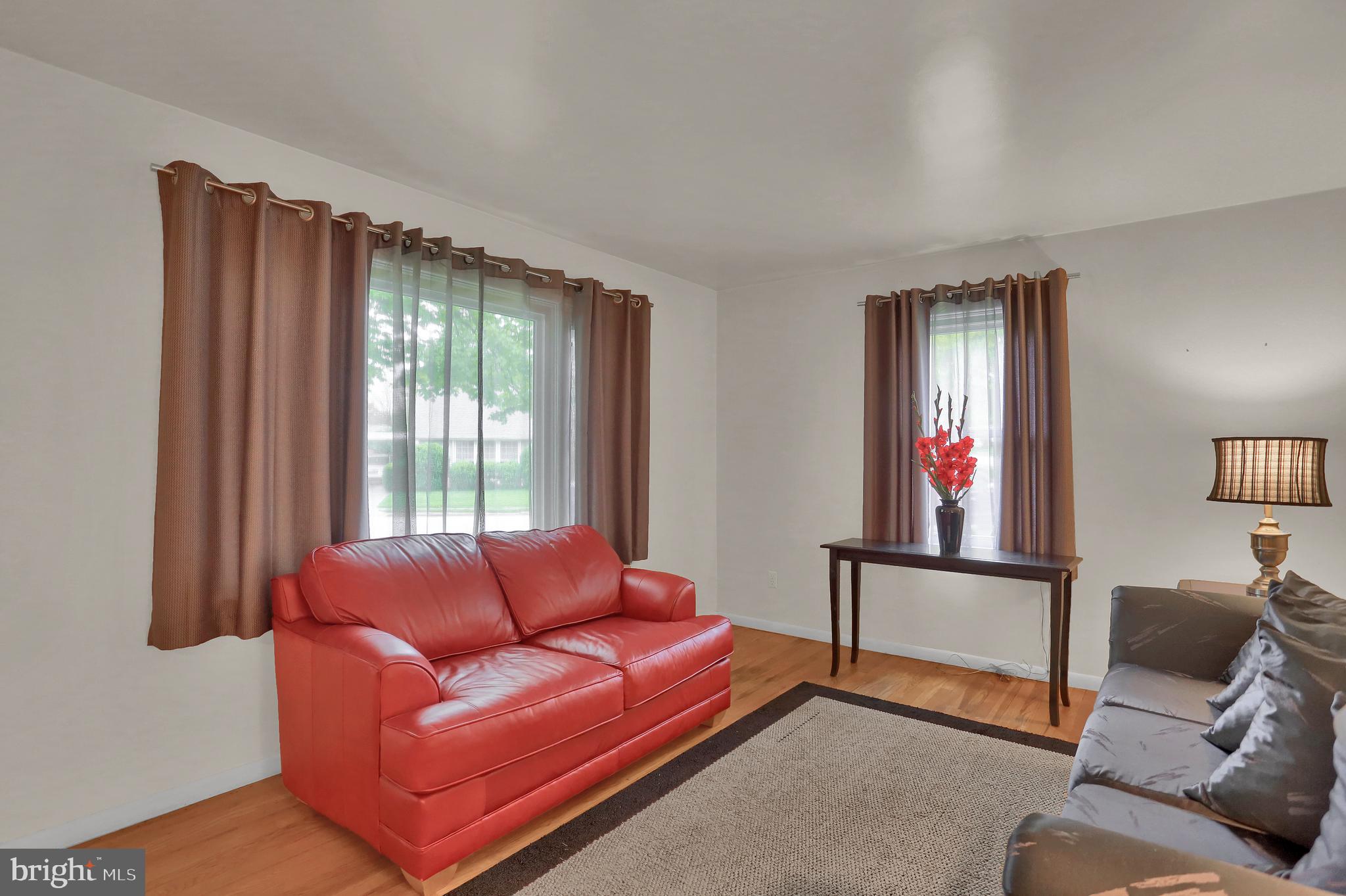 741 Gunnison Road York, PA 17404 - Photo 5 of 35 a living room with furniture and a window