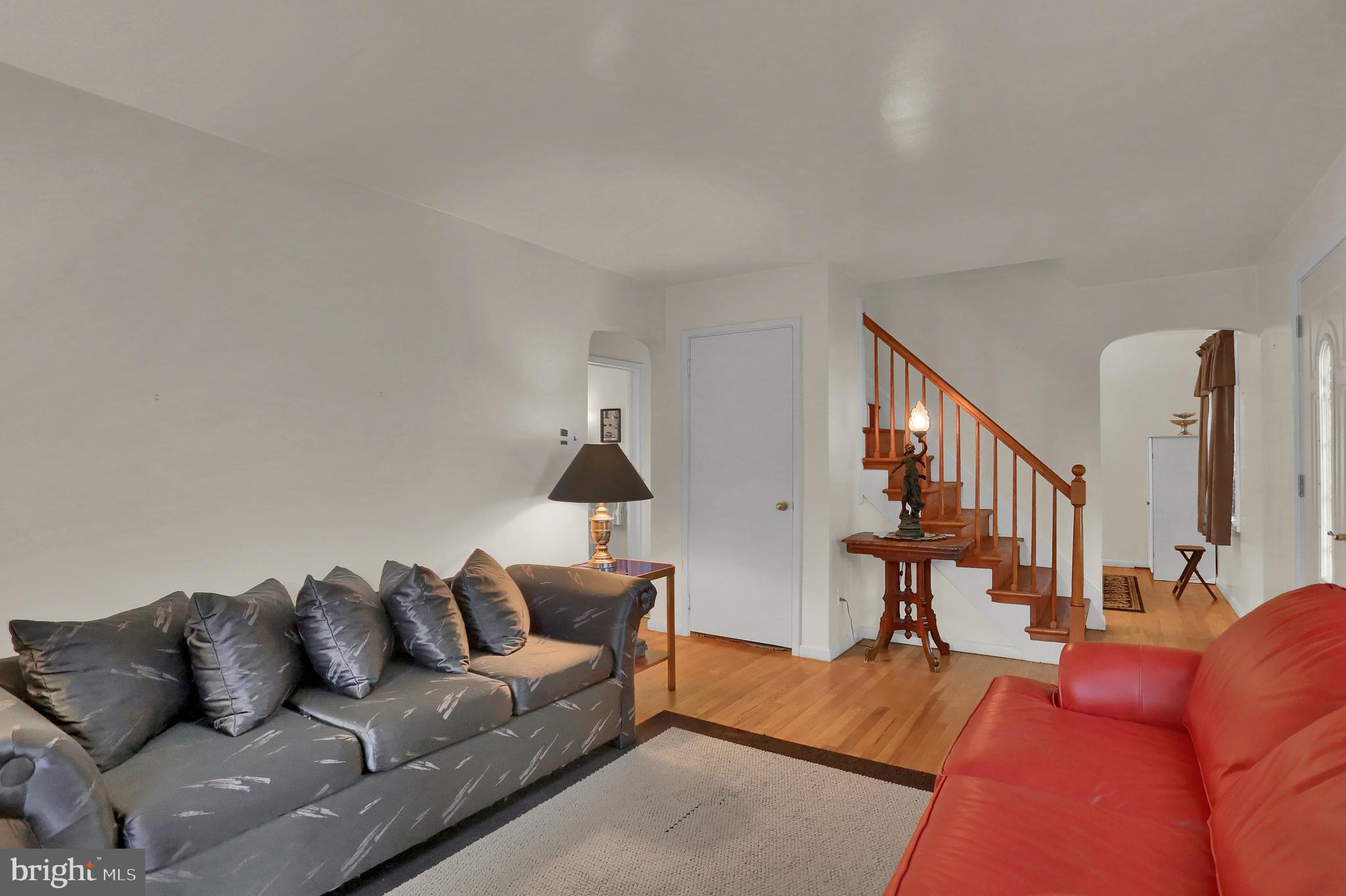 741 Gunnison Road York, PA 17404 - Photo 6 of 35 a living room with furniture and a lamp