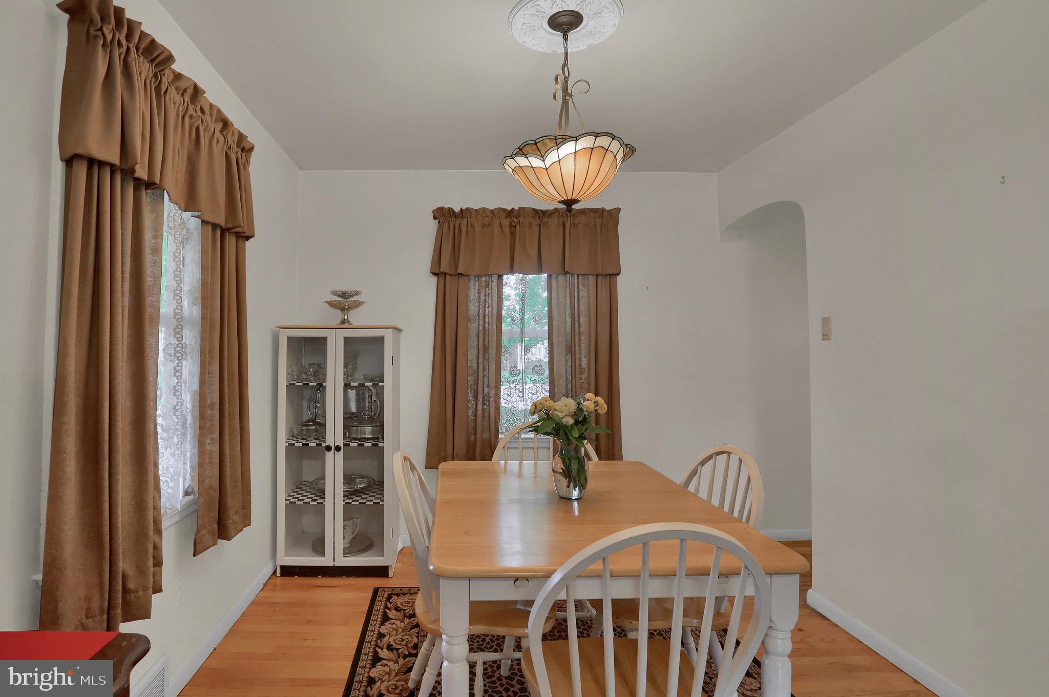 741 Gunnison Road York, PA 17404 - Photo 10 of 35 a view of a dining room with furniture window and wooden floor