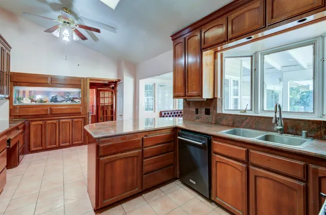 a bedroom with furniture and wooden floor