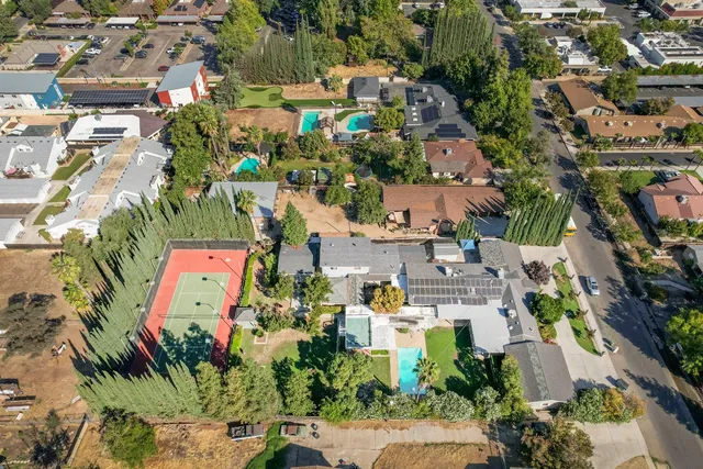 a kitchen with a stove and a refrigerator