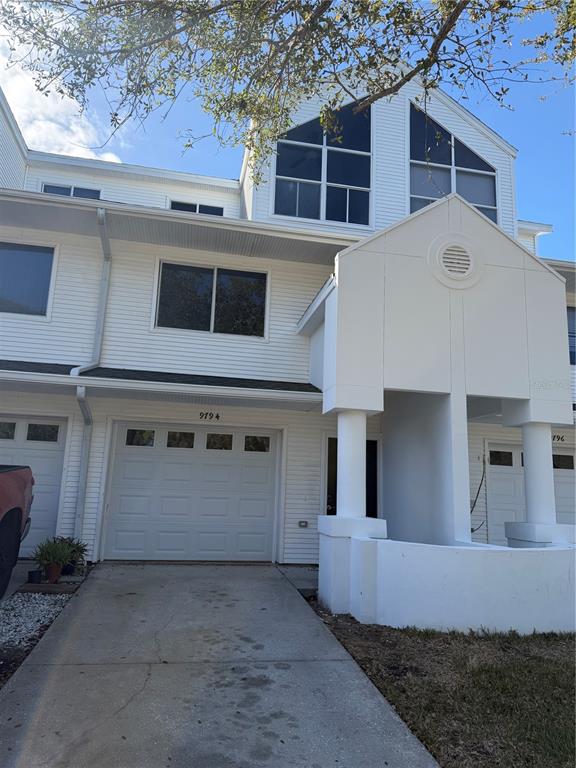 9794 Indian Key Trail, Unit 91 Seminole, FL 33776 - Photo 1 of 20 a house view with a outdoor space