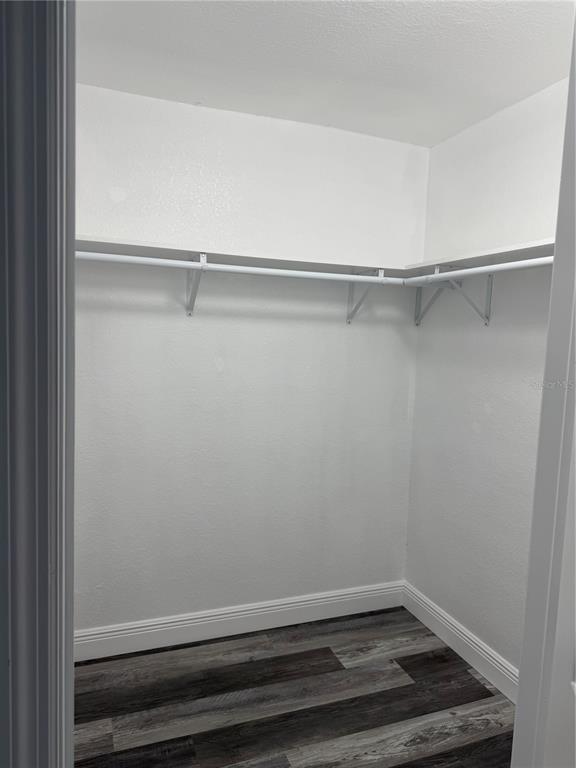 9794 Indian Key Trail, Unit 91 Seminole, FL 33776 - Photo 7 of 20 a view of an empty walk in closet