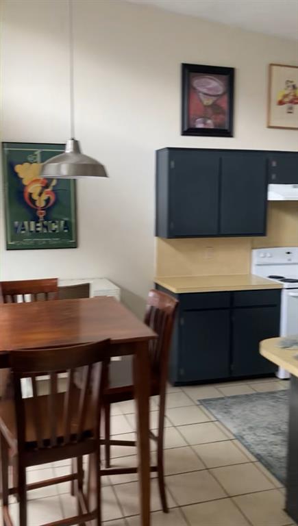 2714 McCart Avenue, Unit 2712 Fort Worth, TX 76110 - Photo 7 of 39 a room with a table and a chair