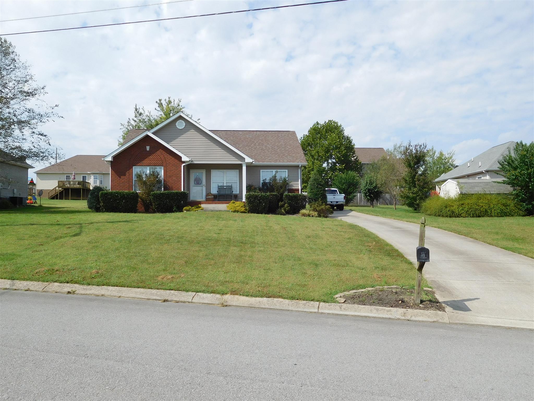 108 Filly Lane Springfield, TN 37172 - Photo 2 of 16 a front view of a house with a yard and garage