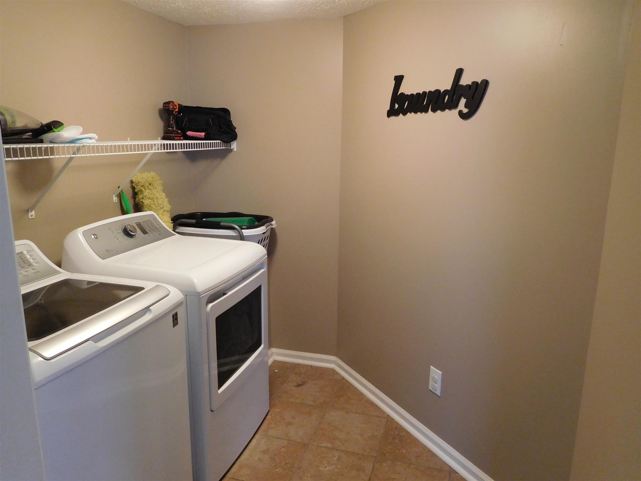 108 Filly Lane Springfield, TN 37172 - Photo 13 of 16 a utility room with dryer and washer