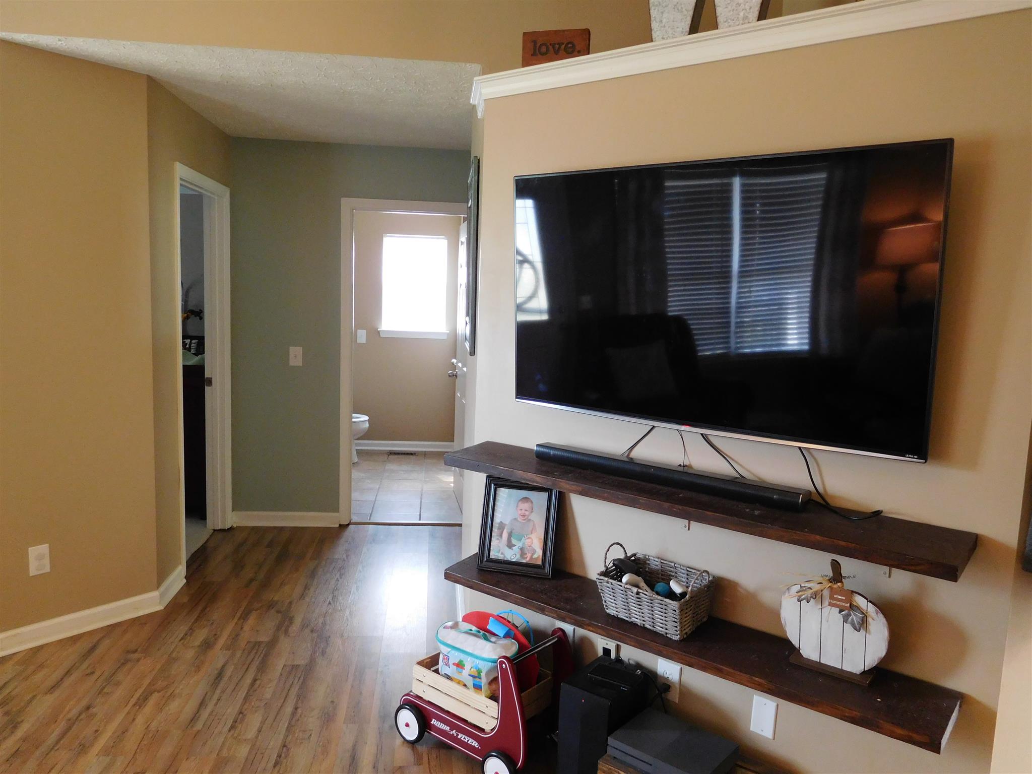 108 Filly Lane Springfield, TN 37172 - Photo 4 of 16 a living room with hard wood floors and a wooden floor