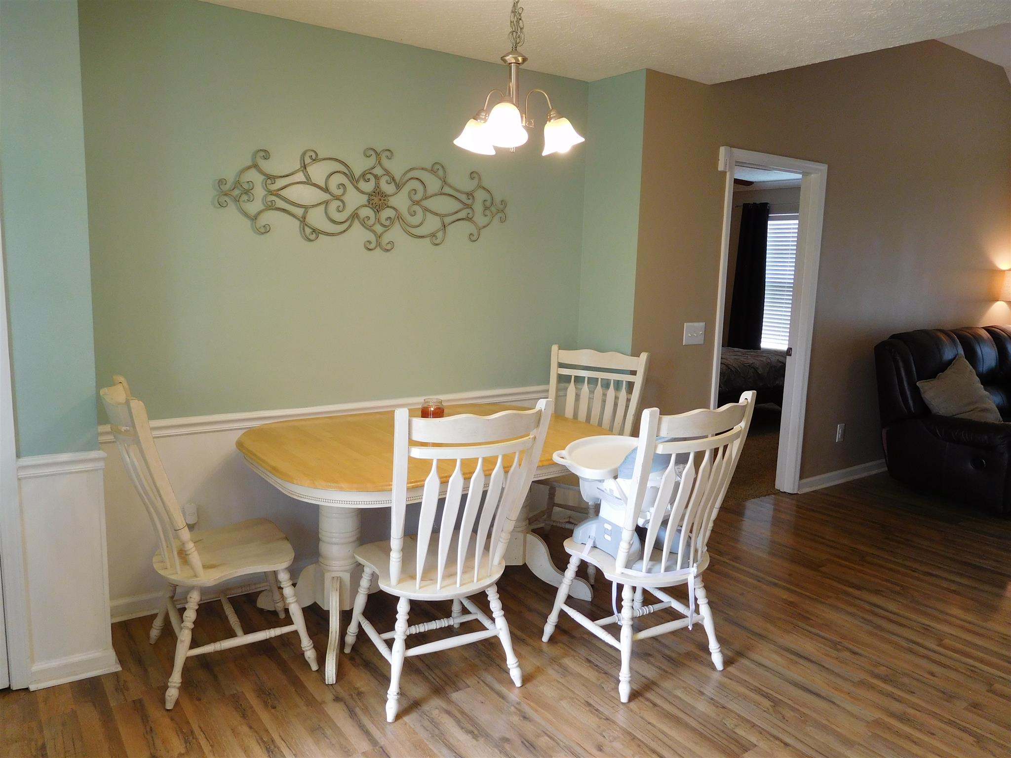 108 Filly Lane Springfield, TN 37172 - Photo 6 of 16 a view of a dining room with furniture wooden floor and chandelier