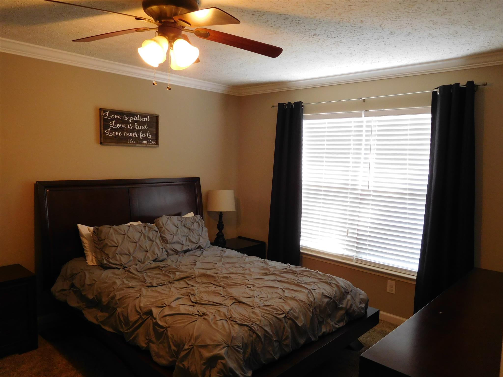 108 Filly Lane Springfield, TN 37172 - Photo 7 of 16 a bedroom with a bed and a window