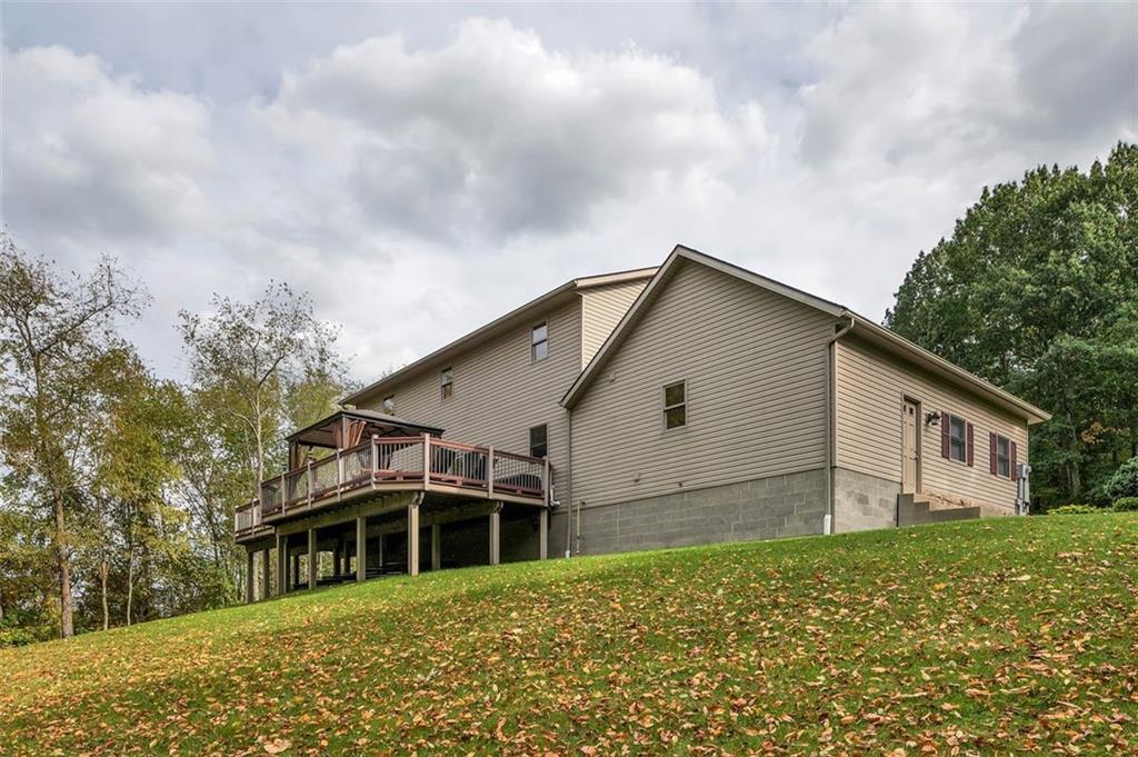201 Ridge Road Eighty Four, PA 15330 - Photo 27 of 36 a view of a house with a garden