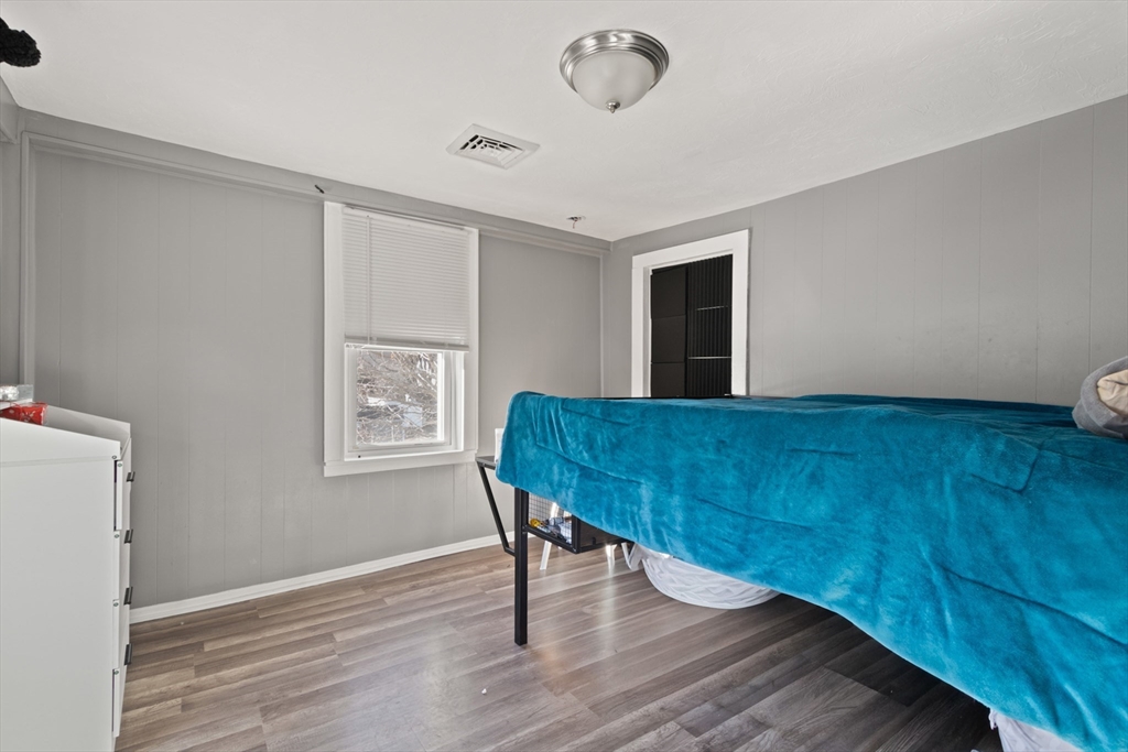 48 Wall Street Bridgewater, MA 02324 - Photo 21 of 29 a view of a livingroom with furniture and wooden floor