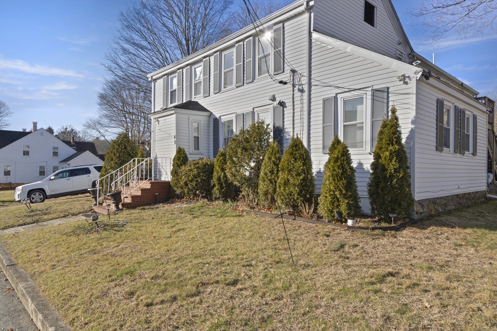 48 Wall Street Bridgewater, MA 02324 - Photo 27 of 29 a view of a house with a yard