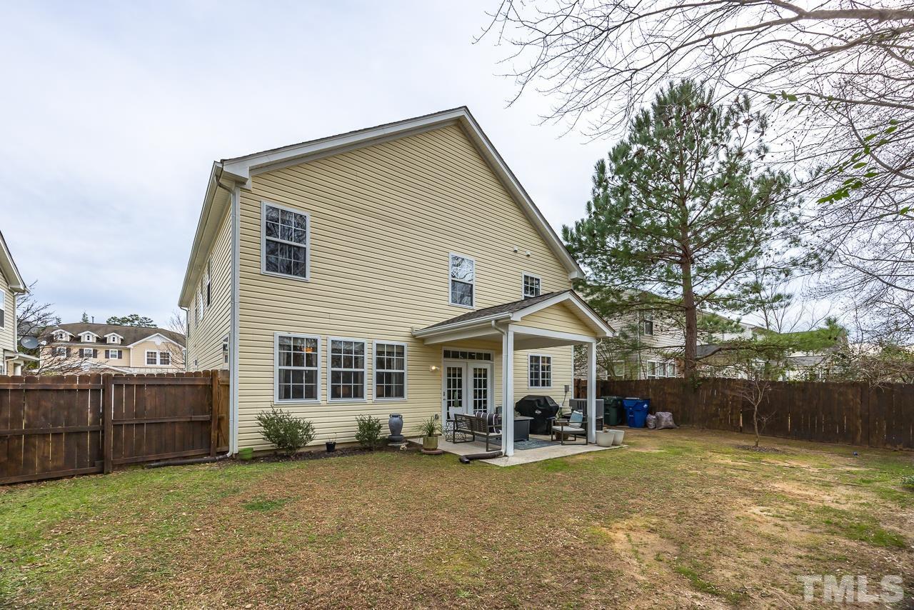 2836 Roundleaf Court Raleigh, NC 27604 - Photo 36 of 39 a view of a house with a yard and fence