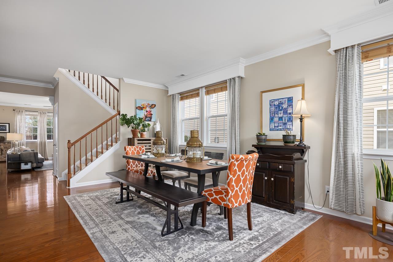 2836 Roundleaf Court Raleigh, NC 27604 - Photo 4 of 39 a view of a livingroom with furniture window and wooden floor