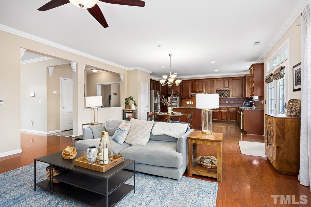 2836 Roundleaf Court Raleigh, NC 27604 - Photo 7 of 39 a living room with lots of furniture and kitchen view