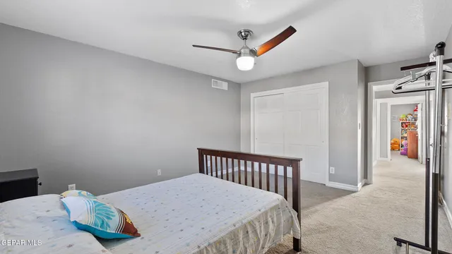 a front view of a house with a yard and outdoor seating