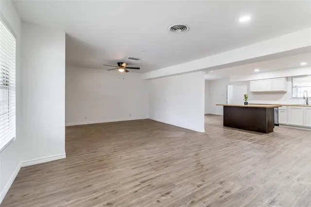 a view of a kitchen with a sink and a dishwasher