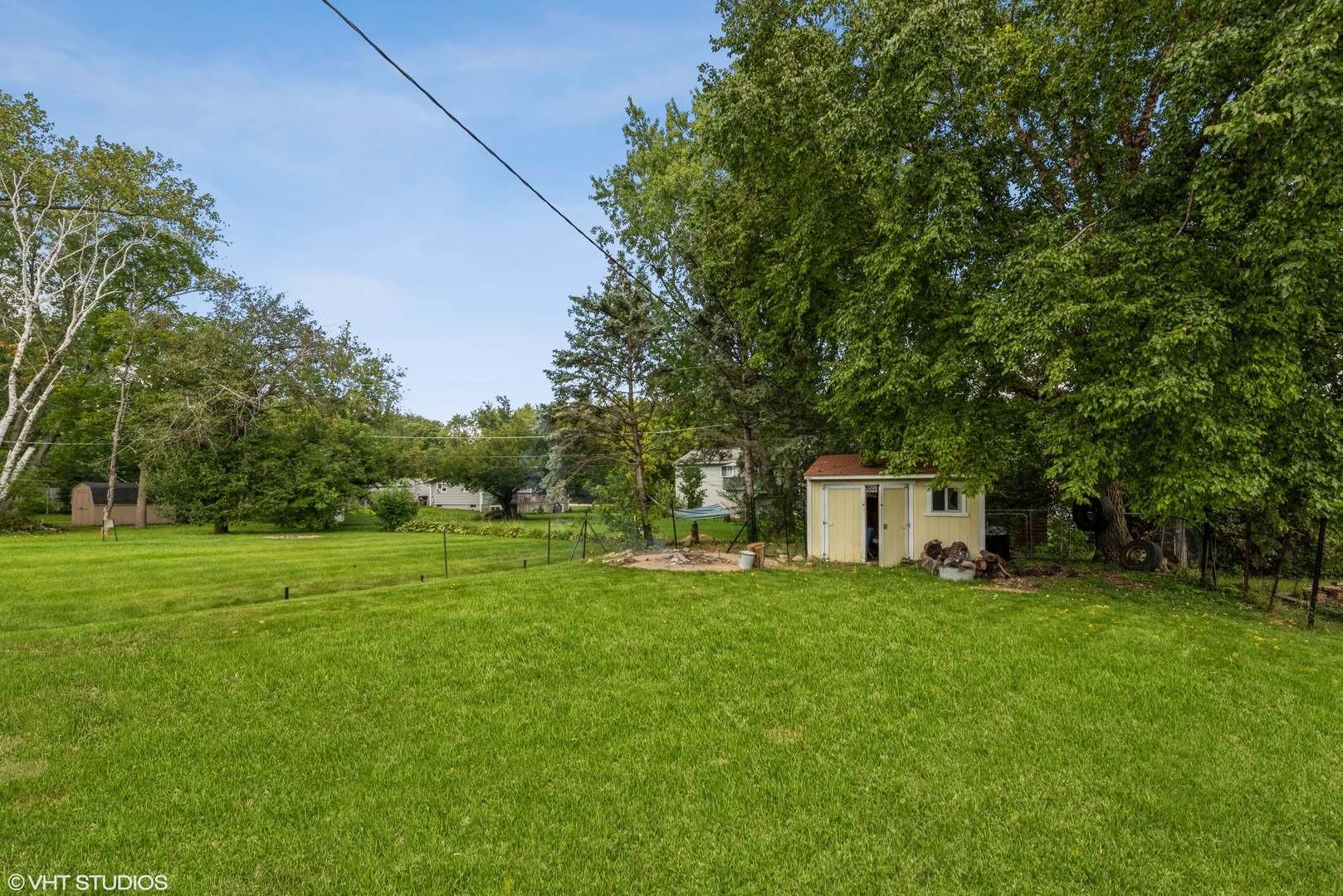 8408 Coral Road Wonder Lake, IL 60097 - Photo 14 of 15 a view of a tiny house with a yard