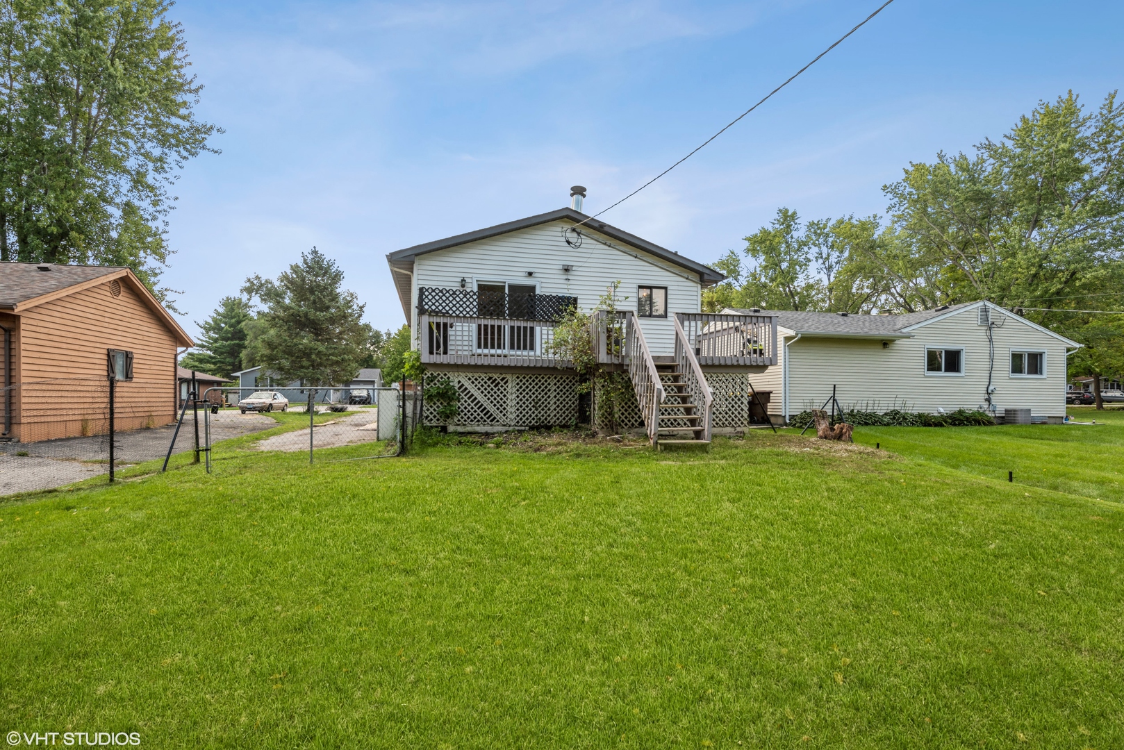 8408 Coral Road Wonder Lake, IL 60097 - Photo 15 of 15 a view of a house with backyard and garden