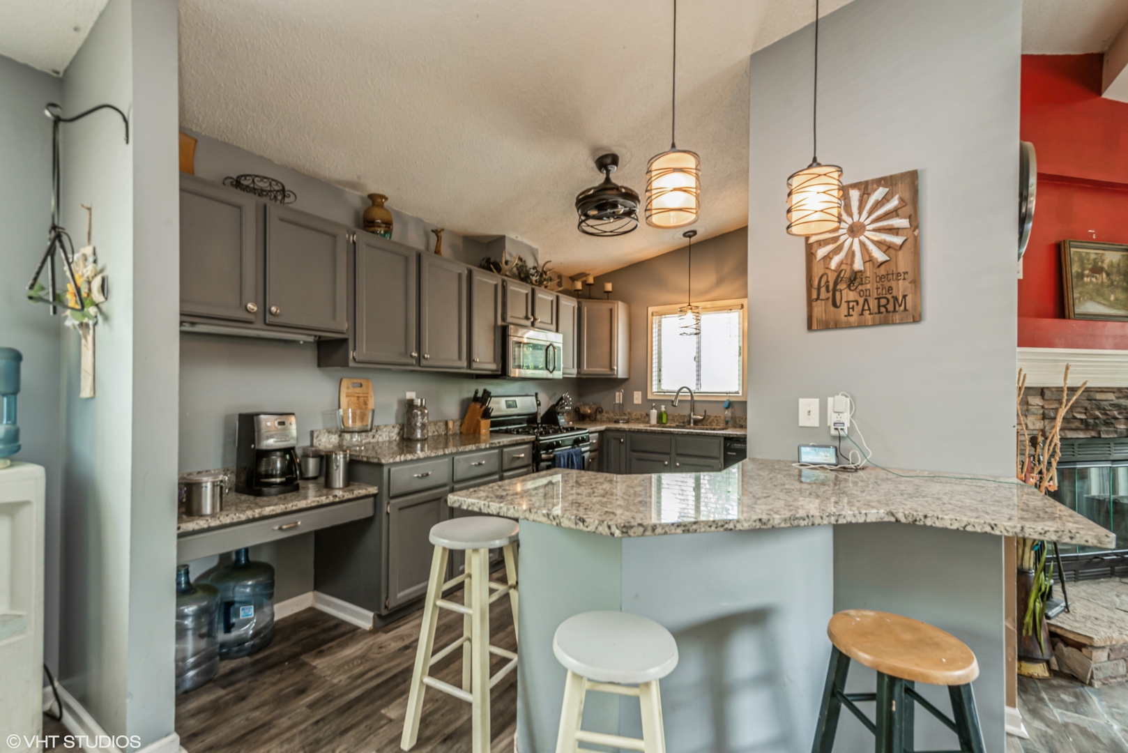 8408 Coral Road Wonder Lake, IL 60097 - Photo 5 of 15 a kitchen with stainless steel appliances granite countertop a sink and cabinets