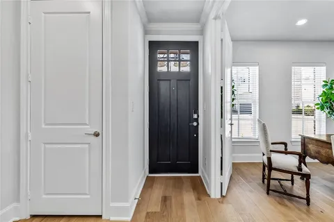 a view of entryway with wooden floor