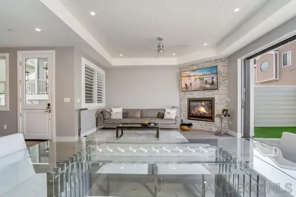 a large kitchen with kitchen island a sink table and chairs