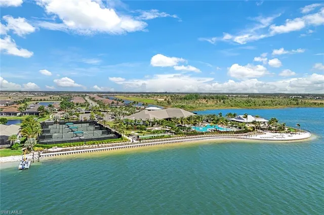 a view of a water with an ocean beach