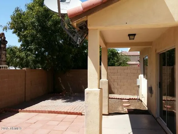 a view of a backyard of a house
