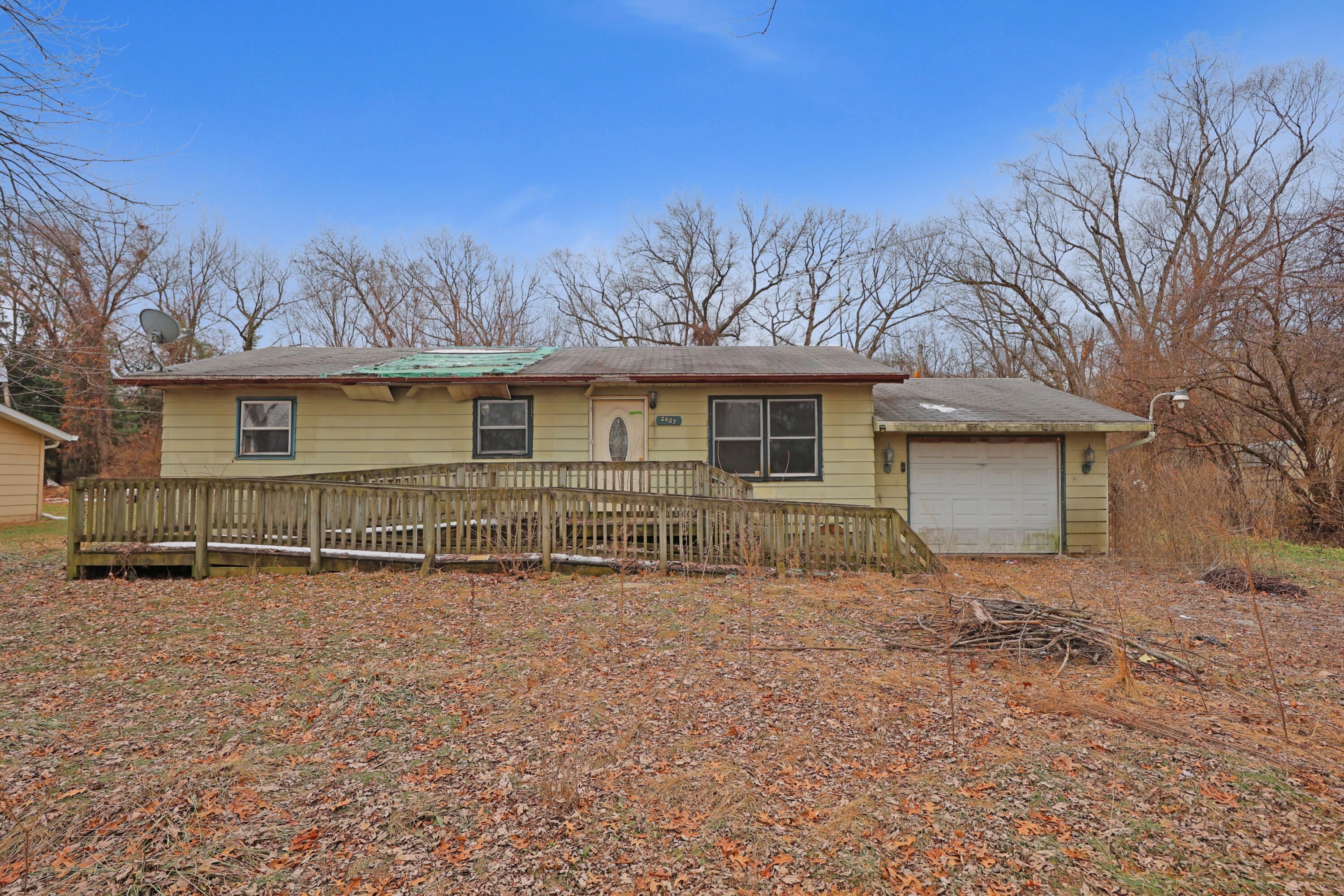 2627 Birch Tree Lane Demotte, IN 46310 - Photo 1 of 23 a front view of a house with a yard