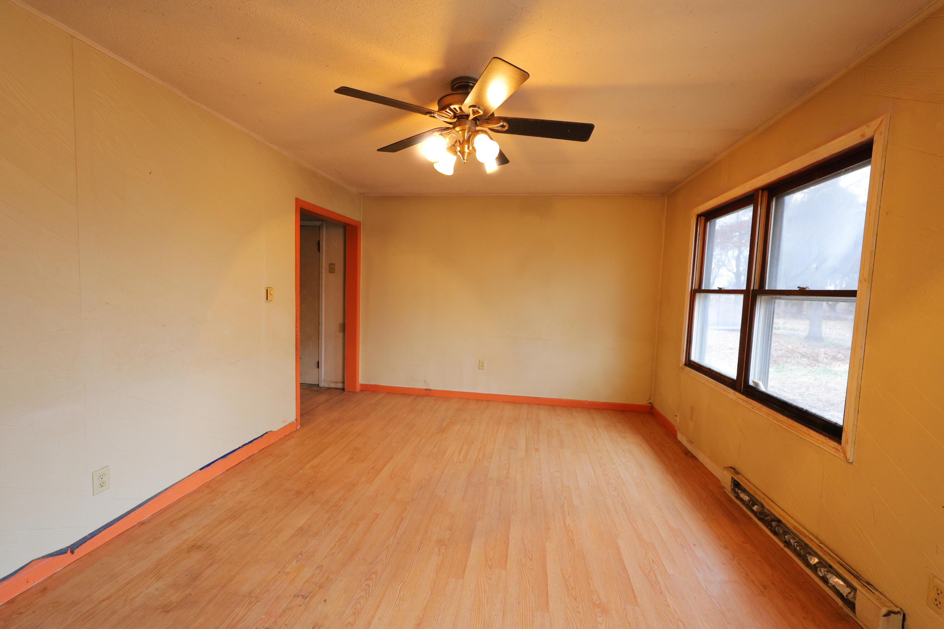 2627 Birch Tree Lane Demotte, IN 46310 - Photo 12 of 23 a view of an empty room with a window