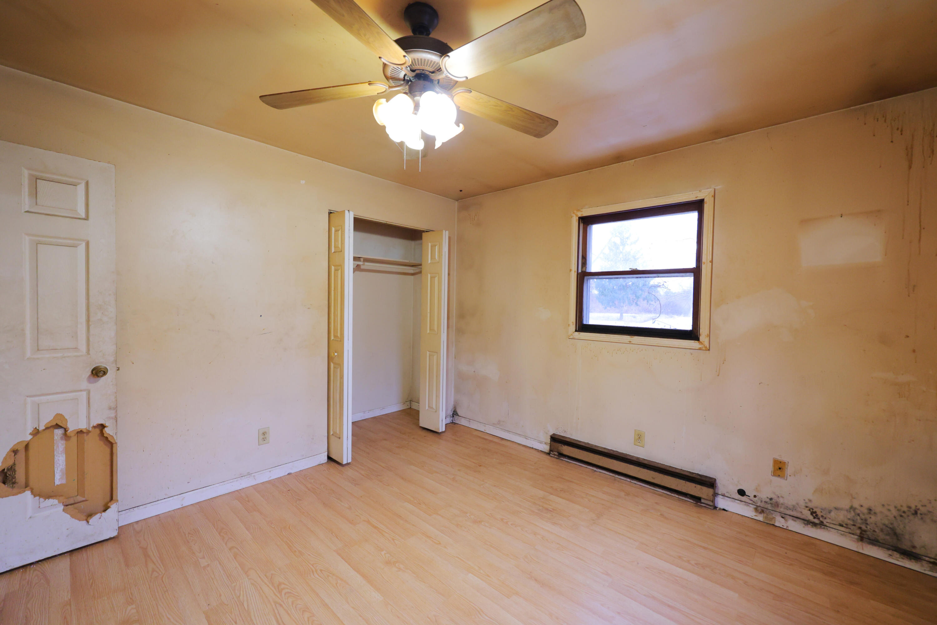 2627 Birch Tree Lane Demotte, IN 46310 - Photo 18 of 23 wooden floor in an empty room with a window