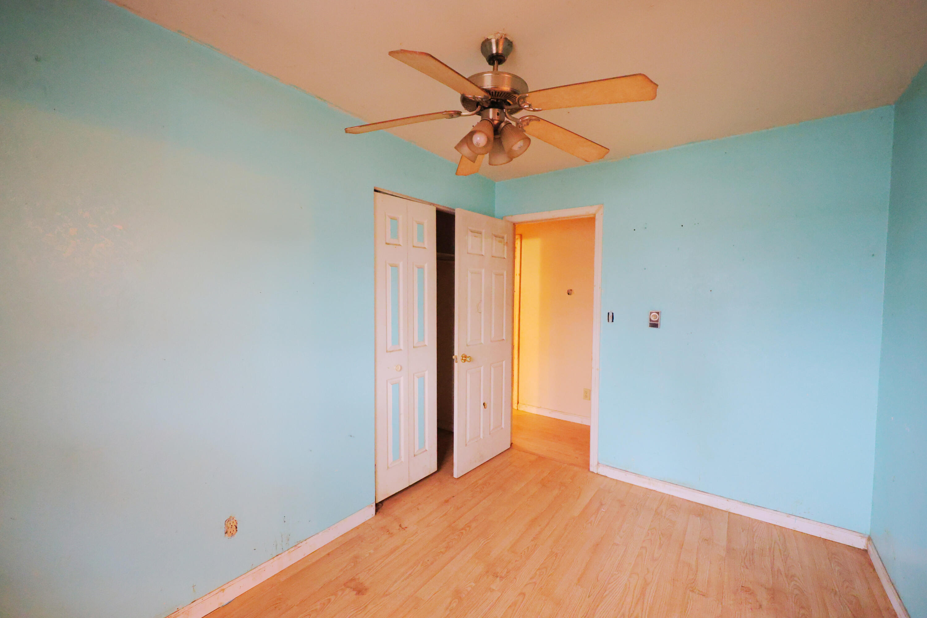 2627 Birch Tree Lane Demotte, IN 46310 - Photo 22 of 23 a view of a hallway with a ceiling fan