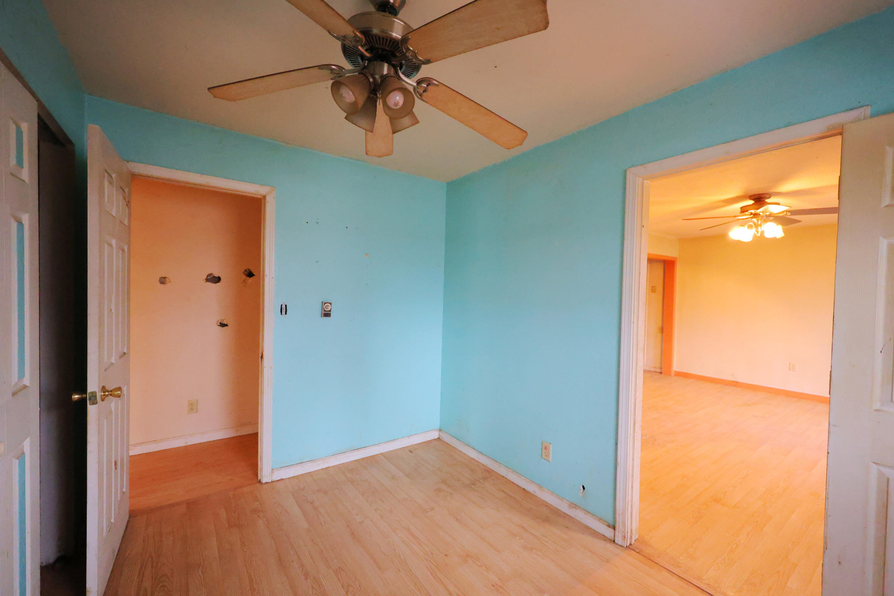2627 Birch Tree Lane Demotte, IN 46310 - Photo 23 of 23 an empty room with a window and a ceiling fan