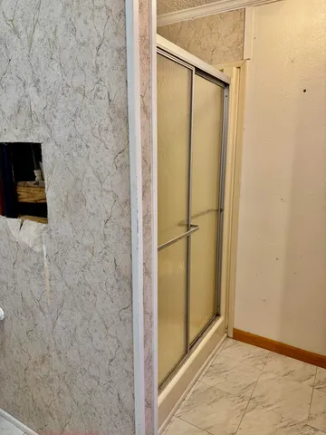 a bathroom with a sink double vanity and a mirror