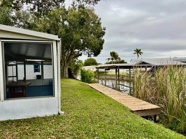 a view of an empty room with a large window