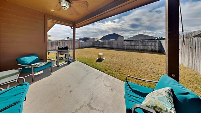 a view of a living room and a window