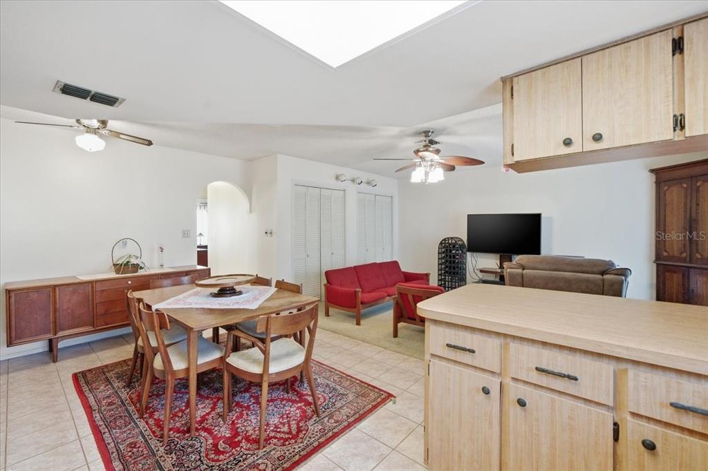 12439 Hanley Drive Spring Hill, FL 34608 - Photo 13 of 36 a view of a dining room with furniture