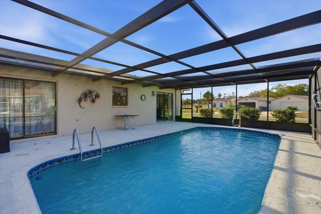 12439 Hanley Drive Spring Hill, FL 34608 - Photo 32 of 36 a room with natural light