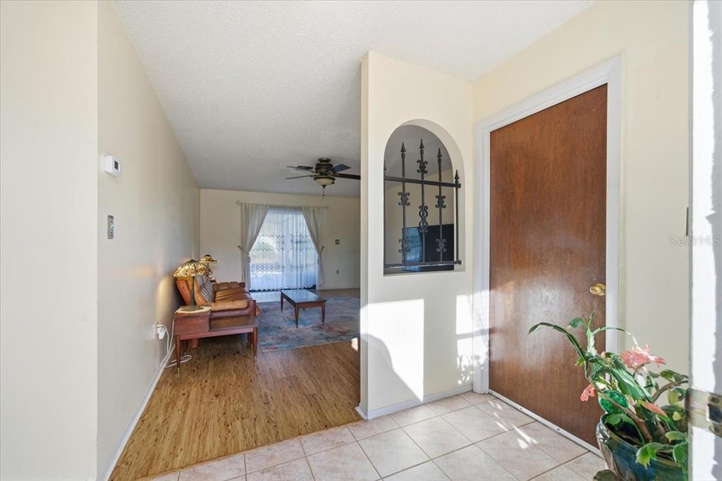 12439 Hanley Drive Spring Hill, FL 34608 - Photo 4 of 36 a living room with furniture