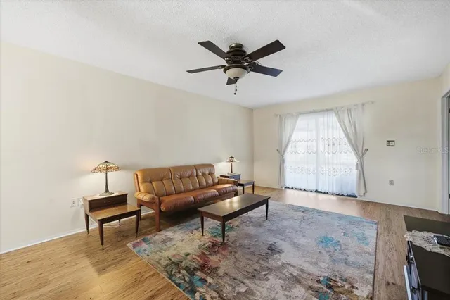 a living room with a couch and a table