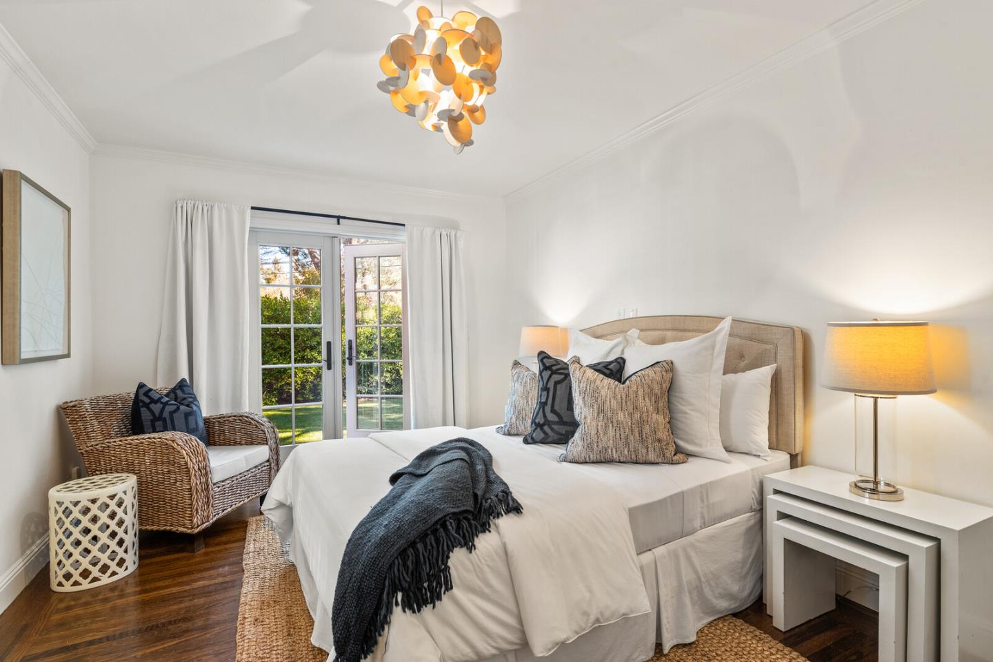 1350 Johnson Street Menlo Park, CA 94025 - Photo 14 of 30 a bedroom with a bed and a chandelier