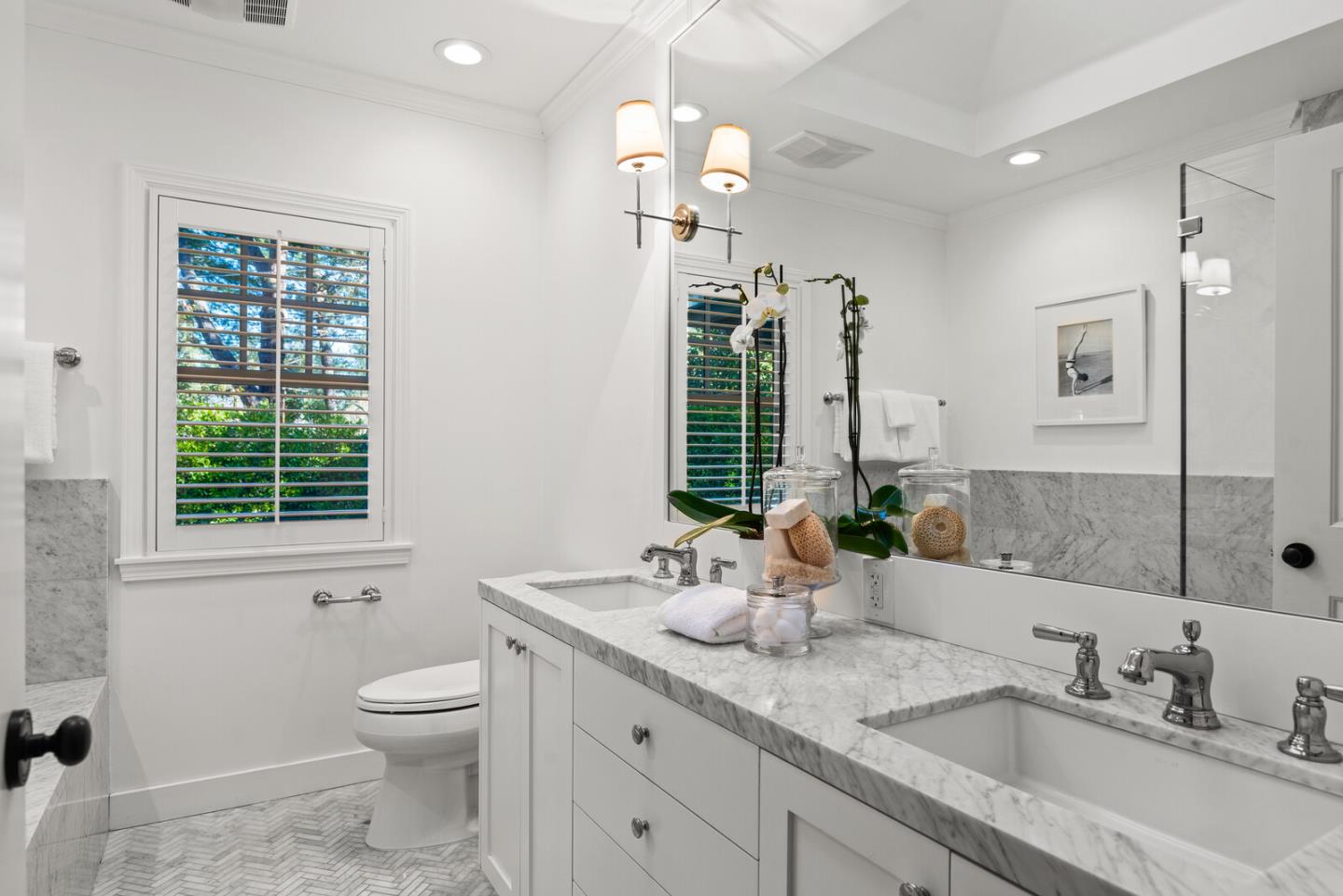 1350 Johnson Street Menlo Park, CA 94025 - Photo 19 of 30 a bathroom with double vanity sink a toilet and a mirror