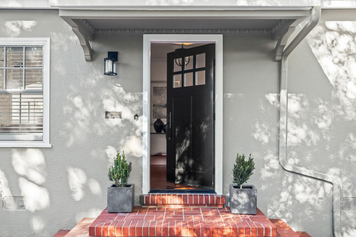 1350 Johnson Street Menlo Park, CA 94025 - Photo 3 of 30 a potted plant in front of a door
