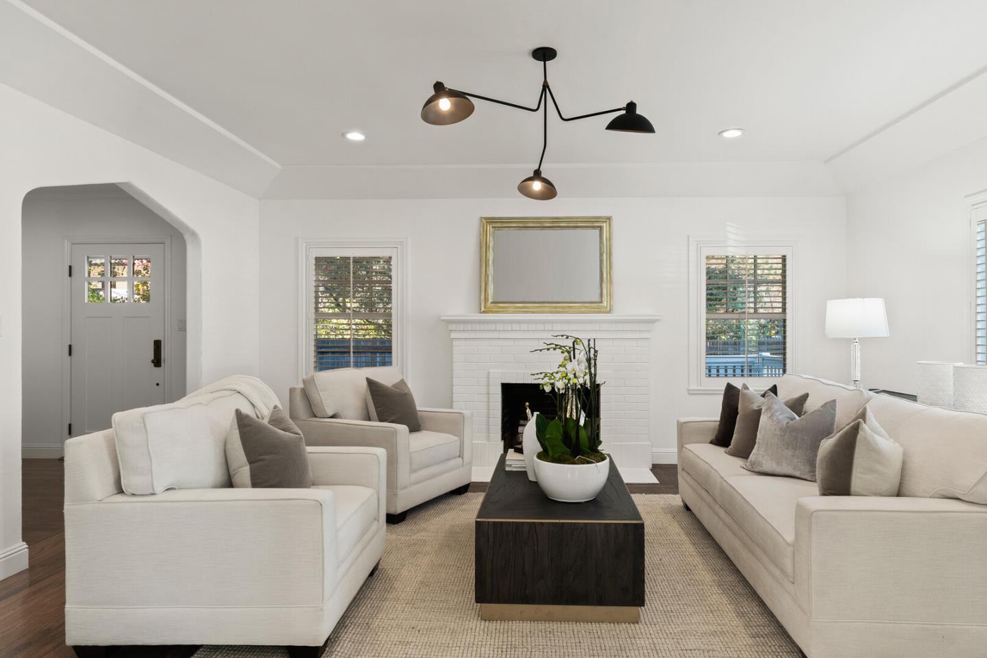 1350 Johnson Street Menlo Park, CA 94025 - Photo 5 of 30 a living room with furniture and a fireplace